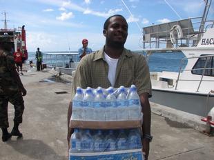 Image #34 - Hurricane Tomas Relief Effort (Carrying the goods to the distribution point)